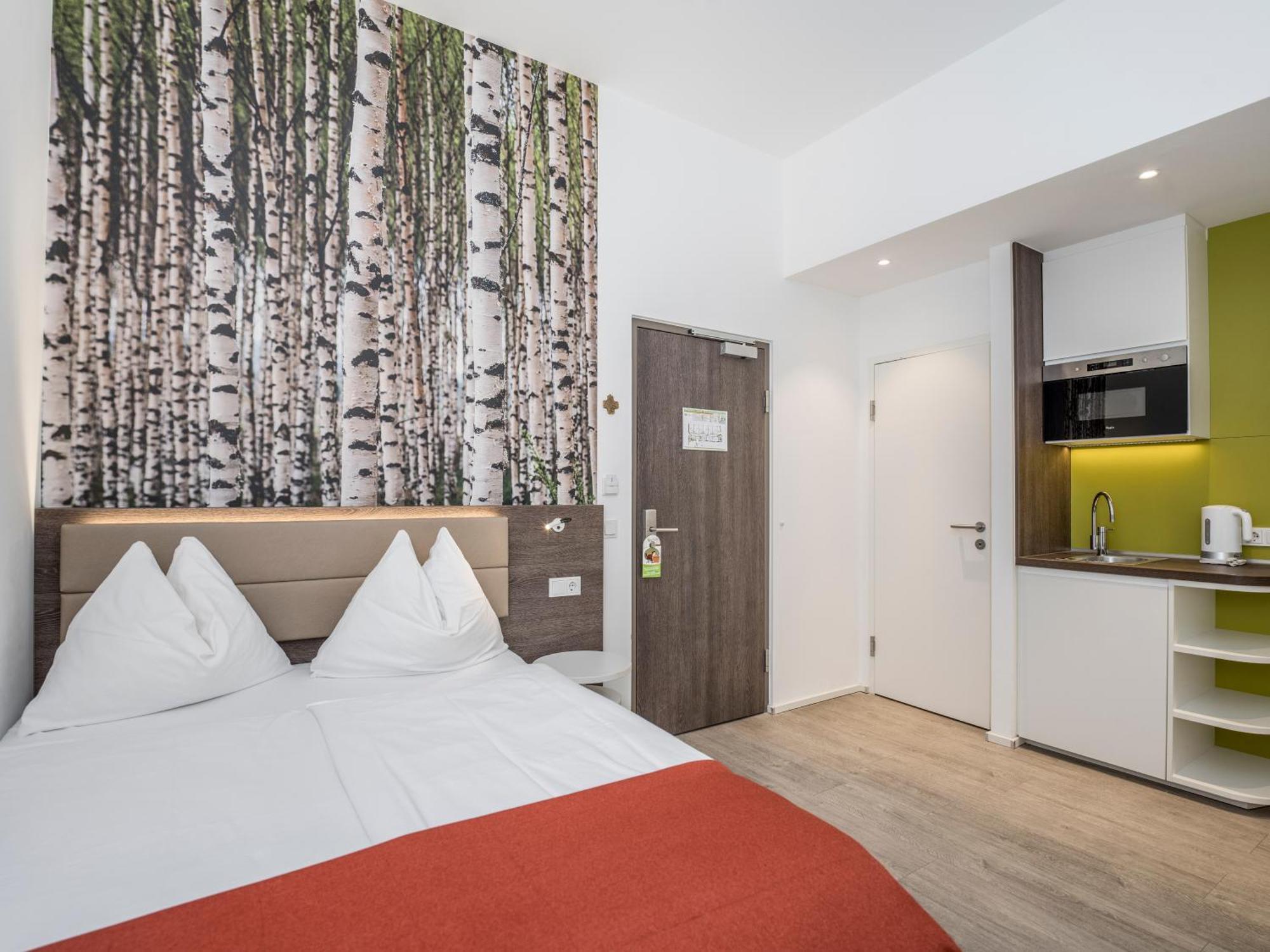 Eco Suite Hotel Salzburg Bagian luar foto
